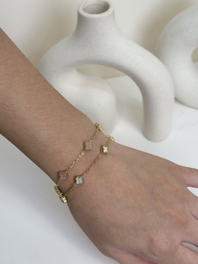 Paired Clover Petite Bracelet in gold-tone, two bracelets layered on the wrist with pastel clover motifs